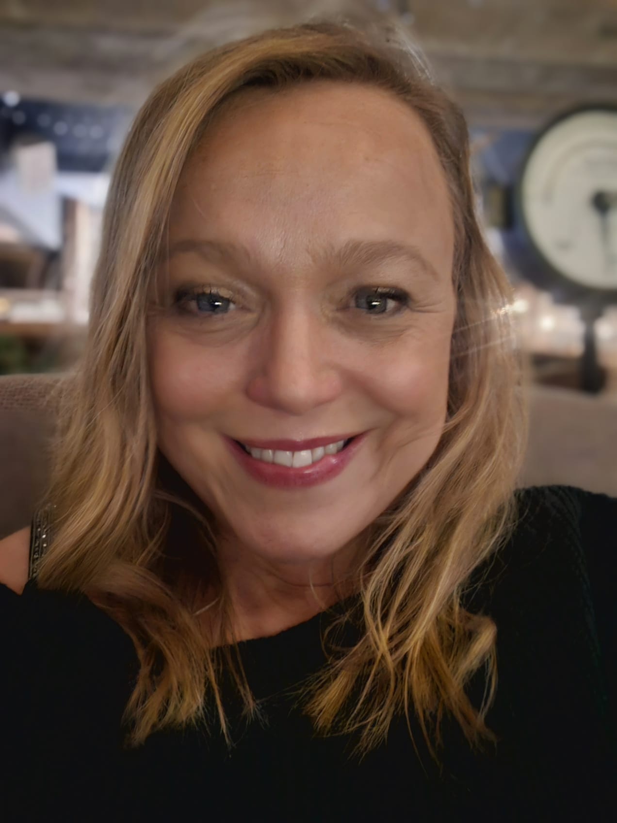 Polly Nicholls teaching English to students